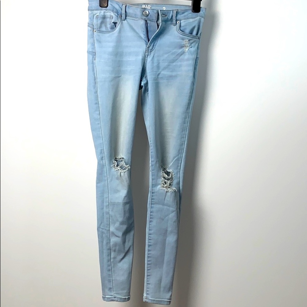 Mid-rise push-up distressed skinny Jeans